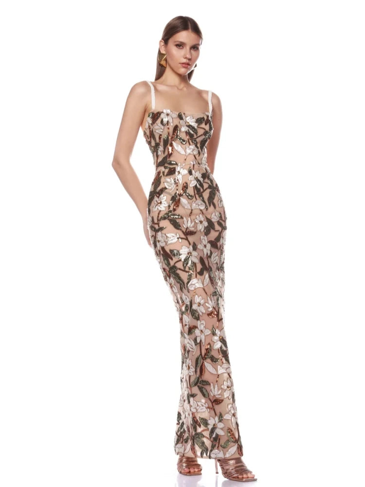 Elegant spaghetti strap sequin-embellished floral-appliqued long dress.